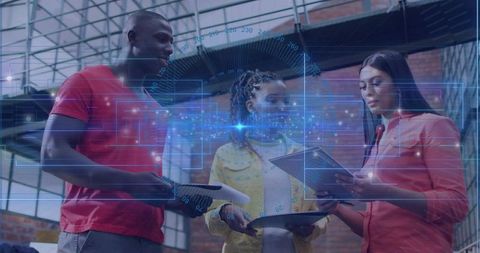 Diverse Team Analyzing Technology with Holographic Interface