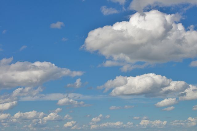 Fluffy White Clouds in Clear Blue Sky - Download Free Stock Photos Pikwizard.com