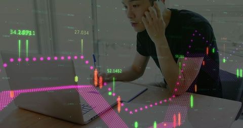 Businessman Analyzing Financial Data with Smartphone and Laptop