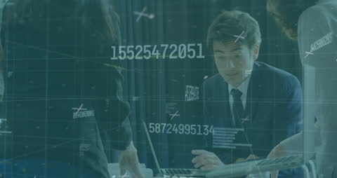Businessman in Office Meeting Analyzing Data and Networks