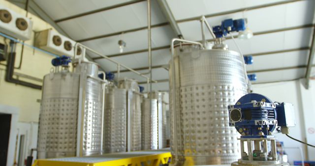 Metal fermentation tanks and equipment in modern brewery - Download Free Stock Images Pikwizard.com