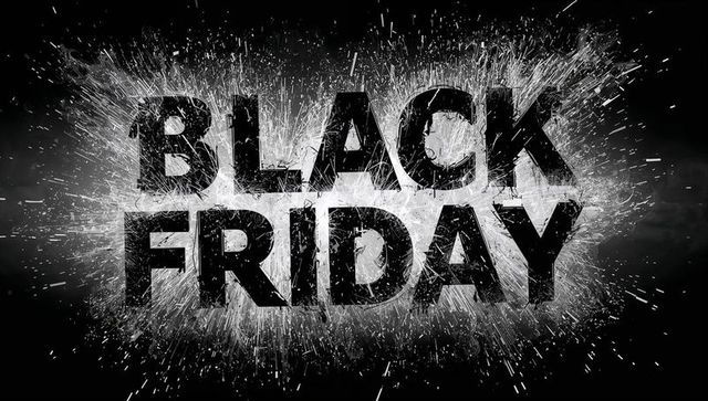 Black friday exploding typography with grunge particle burst and high-contrast monochrome