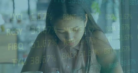 Businesswoman Analyzing Financial Trends Overlaid with Indicators