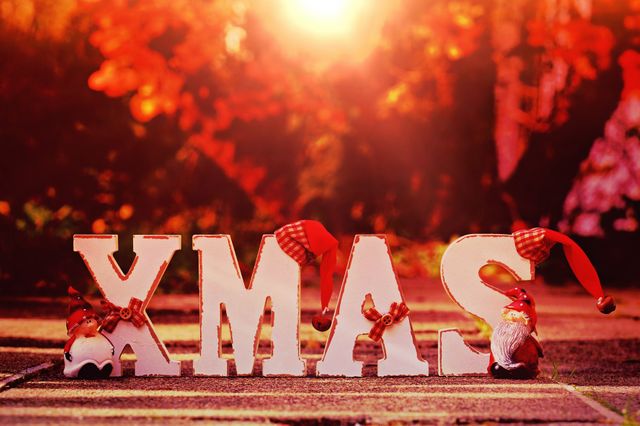 Xmas Letters with Santa Hats in Outdoor Sunlight - Download Free Stock Photos Pikwizard.com