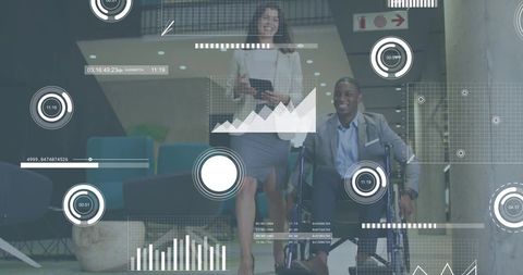 Business team collaborating with wheelchair professional in modern lobby with hud analytics
