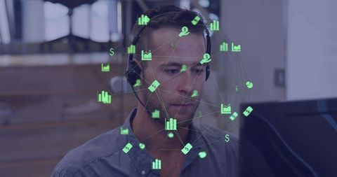 Customer support agent wearing headset analyzing financial data overlay on monitor