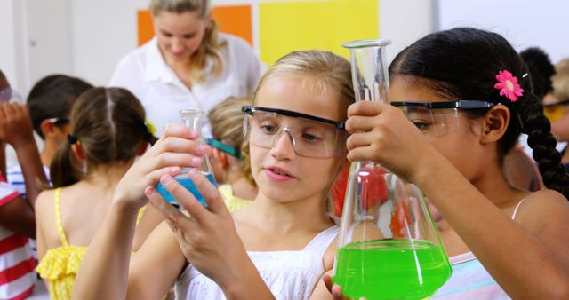 Children Engaged in Science Experiment with Colorful Liquids - Download Free Stock Images Pikwizard.com