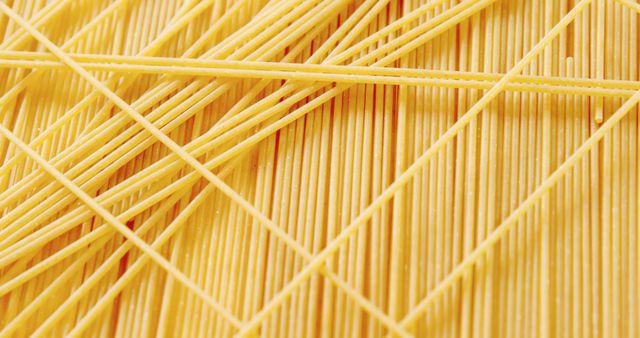 Close-up of raw spaghetti on white background - Download Free Stock Photos Pikwizard.com