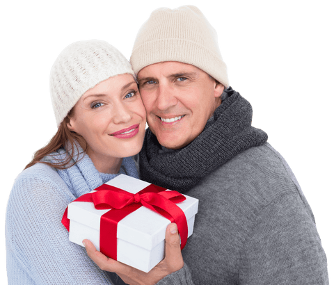 Senior Couple in Warm Clothing Holding Gift on Transparent Background