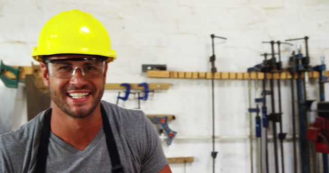 Smiling Carpenter At Workshop With Tools In Background - Download Free Stock Images Pikwizard.com