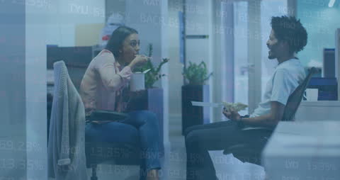 Diverse Colleagues Discussing Over Lunch Amid Digital Overlay