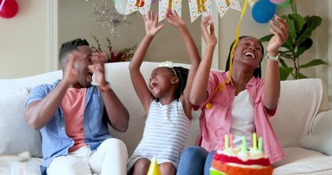Joyful Family Celebrating Birthday Together at Home