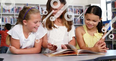 Girls reading together in library with percentage signs overlay