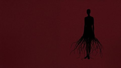 Silhouette with Root-Like Tendril Skirt on Maroon Background