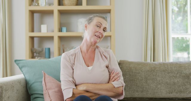 Senior Woman Relaxing on Couch at Home - Download Free Stock Images Pikwizard.com