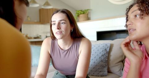 Diverse Friends Engaging in Conversation at Home