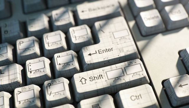 Blueprint keycaps featuring enter, shift, ctrl with monitor icons and grid overlay