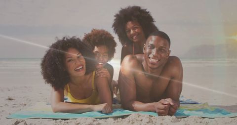 Joyful African American Family Relaxing on Beach Holiday