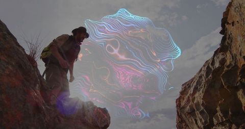 Adventurous Hiker Engages with Futuristic Neon Orb Phenomenon