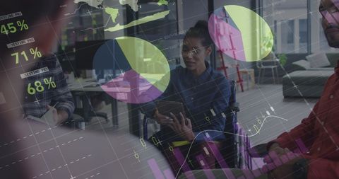 Diverse team analyzing financial data and growth charts in office