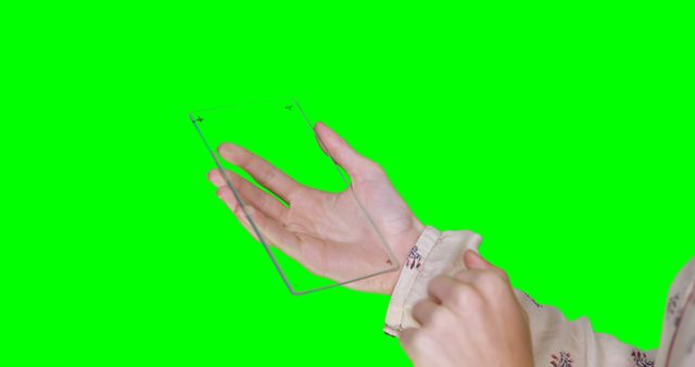Person Holding Transparent Tablet on Green Screen Background - Download Free Stock Images Pikwizard.com