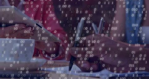 Analog-to-Digital Workflow: Hands Writing Notes with Smartphone, Coffee and Binary Code Overlay