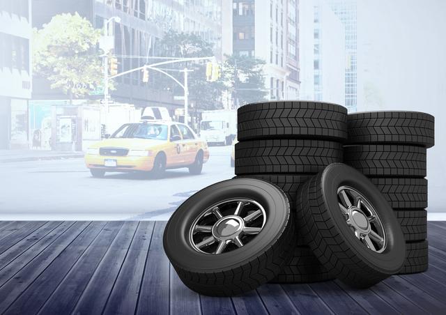 This digital composition shows a stack of car tires in a modern urban garage. The urban setting with a taxi in the background suggests a city environment, making it ideal for automobile servicing, tire companies, and transportation-related businesses. It is useful for illustrating automotive maintenance, repair services, or promoting tire-related products.