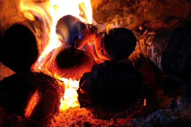 Close-Up of Burning Log Pieces in Fireplace - Download Free Stock Photos Pikwizard.com