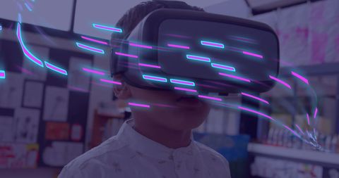 Young Boy Exploring Virtual Reality with Neon Data Trails - Download Free Stock Images Pikwizard.com