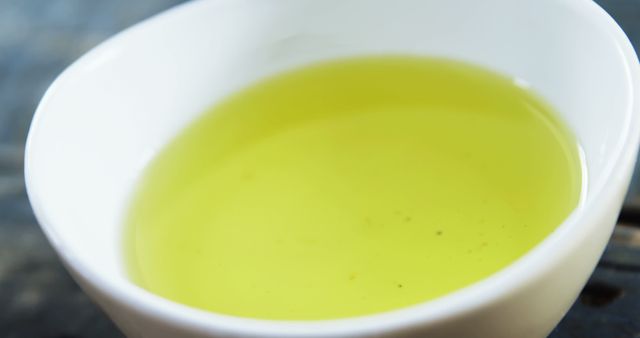 Fresh Olive Oil in White Bowl on Rustic Table - Download Free Stock Images Pikwizard.com