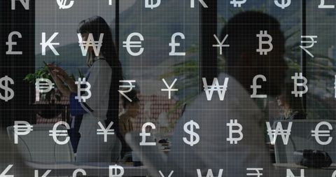 Business Team Collaborating in Office with Global Currency Overlay