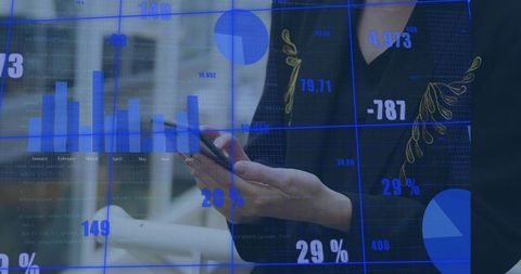 Businesswoman holding smartphone and viewing blue analytics dashboards with data overlay