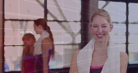 Cheerful Young Woman Combining Fitness with Digital Goals in Gym