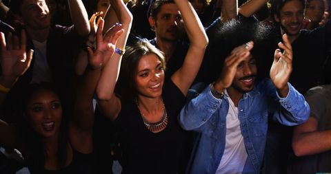 Diverse Crowd Enjoying Lively Nighttime Concert - Download Free Stock Images Pikwizard.com