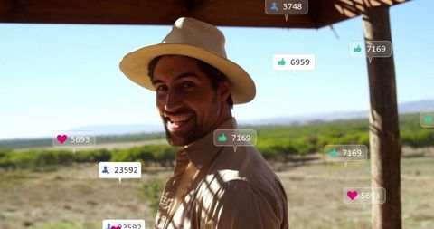 Smiling Traveler Enjoying Outdoors with Social Media Icons Overlay