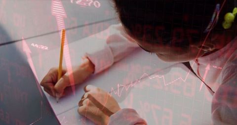 Young student with financial and tech overlay studying at desktop