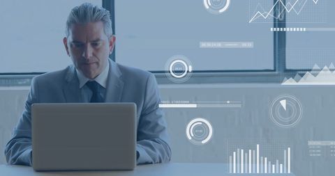 Businessman Analyzing Data with Holographic Interface in Modern Office - Download Free Stock Images Pikwizard.com