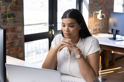 Female Professional Collaborating at Work in Stylish Office