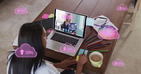 Woman Engaged in Virtual Meeting with Digital Cloud Graphics - Download Free Stock Images Pikwizard.com