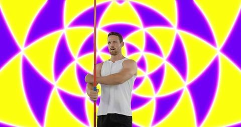Javelin thrower against vibrant geometric pattern