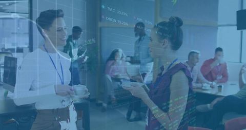 Professional Women Engaging in Office Networking