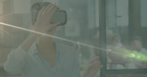 Woman Exploring Virtual Reality in Office Setting