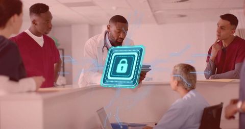 Doctor discussing data security at hospital nursing station