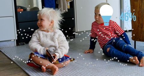 Siblings Enjoying Leisure Time on Modern Living Room Floor