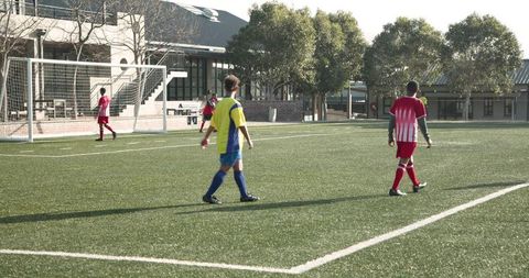 Sunny Day Soccer Practice with Focused African American Players