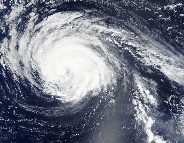 Typhoon Kilo continues to thrive in the Northwestern Pacific and imagery from NASA's Terra satellite late on September 7 showed that the storm still maintained a clear eye.  The MODIS or Moderate Resolution Imaging Spectroradiometer instrument that flies aboard Terra provided a visible-light image of Kilo on September 7 at 23:50 UTC (7:50 p.m. EDT). The image showed thick bands of thunderstorms wrapping around the eastern and northern quadrants of the visible eye.  At 0900 UTC (5 a.m. EDT) on September 9, Typhoon Kilo had maximum sustained winds near 65 knots (74.8 mph/120.4 kph). Kilo is expected to strengthen to 75 knots (86.3 mph/ 138.9 kph) later in the day before weakening. It was centered near 26.8 North latitude and 158.5 East longitude, about 289 nautical miles northeast of Minami Tori Shima, Japan. Kilo was moving to the west-northwest at 18 knots (20.7 mph/33.3 kph).  The Joint Typhoon Warning Center noted that Kilo is expected to take more of a northerly track by September 10. Thereafter, Kilo is expected to become extra-tropical and curve to the northeast near the Kuril Islands in Russia's Sakhalin Oblast region. The islands form an 808 mile (1,300 kilometer) volcanic archipelago that stretches northeast from Hokkaido, Japan, to Kamchatka, Russia.  For updated watches and warnings from the Japan Meteorological Agency, visit: <a href="http://www.jma.go.jp/en/warn/" rel="nofollow">www.jma.go.jp/en/warn/</a>  <b><a href="http://www.nasa.gov/audience/formedia/features/MP_Photo_Guidelines.html" rel="nofollow">NASA image use policy.</a></b>  <b><a href="http://www.nasa.gov/centers/goddard/home/index.html" rel="nofollow">NASA Goddard Space Flight Center</a></b> enables NASA’s mission through four scientific endeavors: Earth Science, Heliophysics, Solar System Exploration, and Astrophysics. Goddard plays a leading role in NASA’s accomplishments by contributing compelling scientific knowledge to advance the Agency’s mission.  <b>Follow us on <a href="http://twitter.com/NASAGoddardPix" rel="nofollow">Twitter</a></b>  <b>Like us on <a href="http://www.facebook.com/pages/Greenbelt-MD/NASA-Goddard/395013845897?ref=tsd" rel="nofollow">Facebook</a></b>  <b>Find us on <a href="http://instagrid.me/nasagoddard/?vm=grid" rel="nofollow">Instagram</a></b>