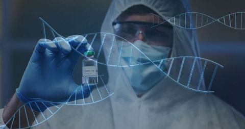 Scientist Analyzing COVID-19 Vaccine in Laboratory