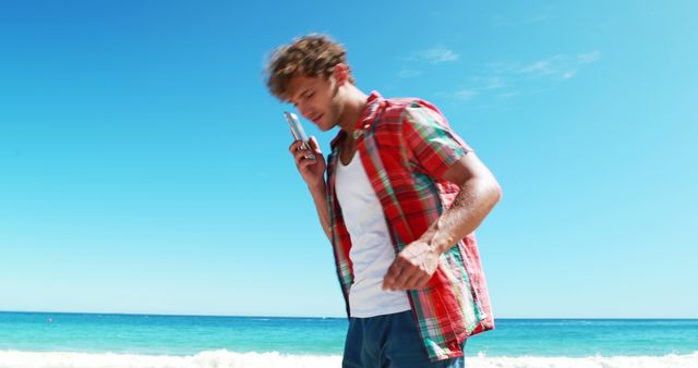 Handsome man talking on mobile phone 4k - Download Free Stock Photos Pikwizard.com