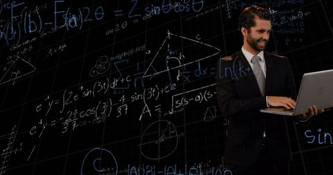 Businessman using laptop with digital math formulas floating in background