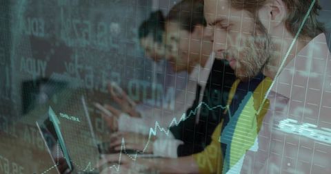 Business Professionals Analyzing Data with Financial Graph Overlay